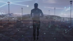Animation of network of connections over african american man running on promenade. Sport, fitness, active lifestyle and connections concept digitally generated video.