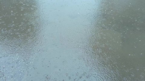 Rain Raindrops Dripping Into Puddle Outdoors Stock Footage Video (100% ...