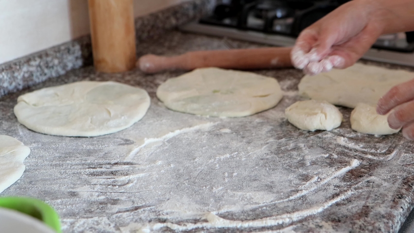 Cooking flatbread at home kitchen, closeup 4k | Shutterstock HD Video #1092419229