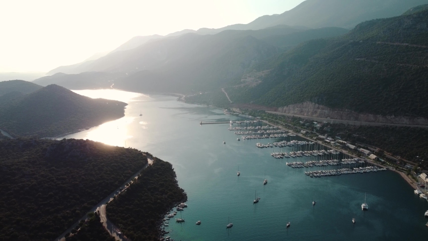 view of the lagoon berth with yachts and boats in the evening