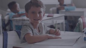 Animation of network of connections over happy caucasian boy at school. School, education, learning, connections and technology concept digitally generated video.