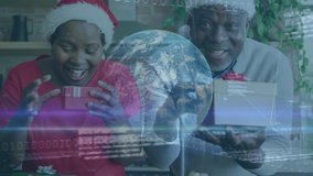 Animation of globe and binary code over happy african american senior couple opening presents. Christmas, tradition, network and technology concept digitally generated video.