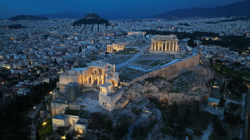 Night drone view of downtown Athens, night view of Acropolis in Athens, aerial view of illuminated Parthenon in Athens in the evening, unesco heritage site in Greece. High quality 4k footage Royalty-Free Stock Footage #1092466117