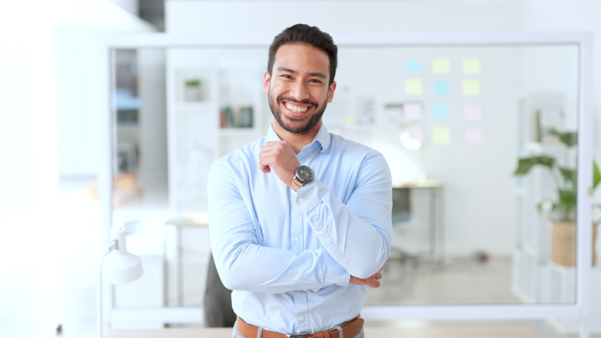 Portrait of confident business man standing in power and assertive stance and feeling ready to challenge global market. Laughing marketing manager, ceo and boss feeling successful with strategy ideas