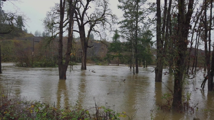 Panning shot of flood waters in Willamette Valley, Oregon, USA
