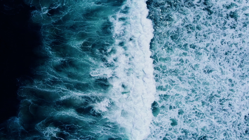 Top-down aerial view of the powerful deep blue ocean waves during the monsoon season amazing video Tropical Sea Andaman Sea : 4K Video High quality Apple ProRes HQ