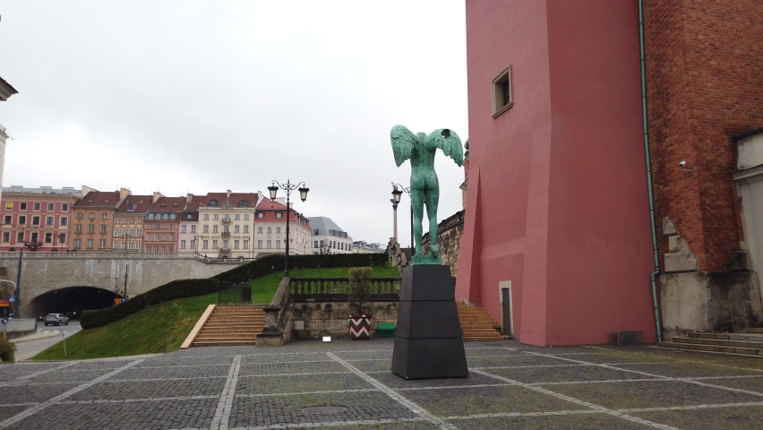 A sculpture "Ikaria" by Igor Mitoraj in front of the Copper-Roof Palace in Warsaw, Poland.
