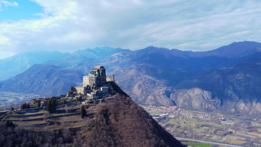Beautiful landscape of Sacra di San Michele (Piedmont, Italy): an ancient abbey near the precipice of a mountain.