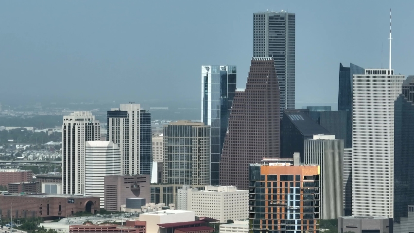 Downtown Texas city skyline. Aerial pan, long zoom. Royalty-Free Stock Footage #1092519525