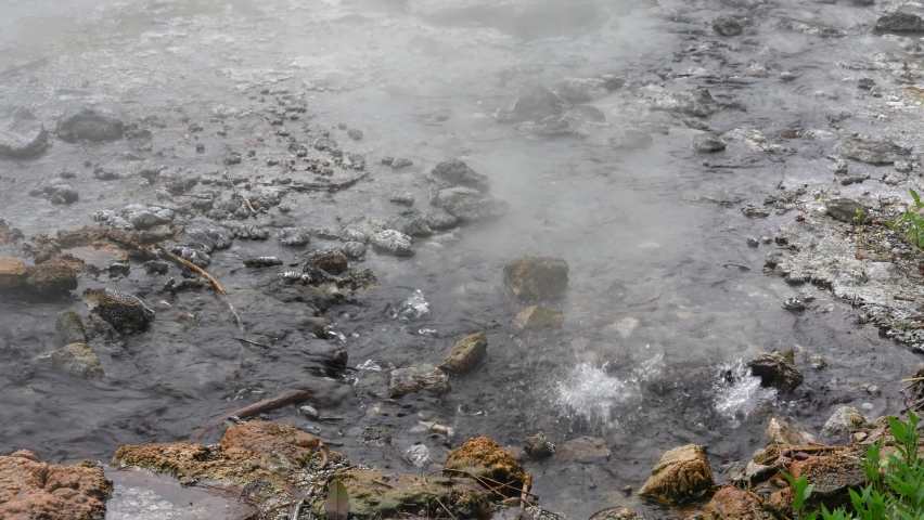 Boiling water in nature pond at Pong Dueat Pa Pae Hot Spring Geyser, Huai Nam Dang National Park, Mae Tang, Chiang Mai, Thailand.
