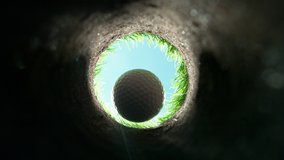 Super Slow Motion Shot of Golf Ball Falling Down Through Clay Hole at 1000 fps. - Powered by Shutterstock - Get 15% off with code: PIKWIZARD15