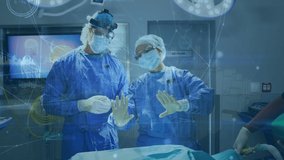 Animation of digital interface over surgeons in operating theatre. global medicine, technology, data processing and digital interface concept digitally generated video.