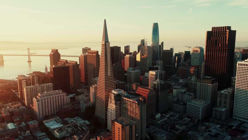 Aerial view of downtown San Francisco with skyscraper buildings at sunrise in California USA