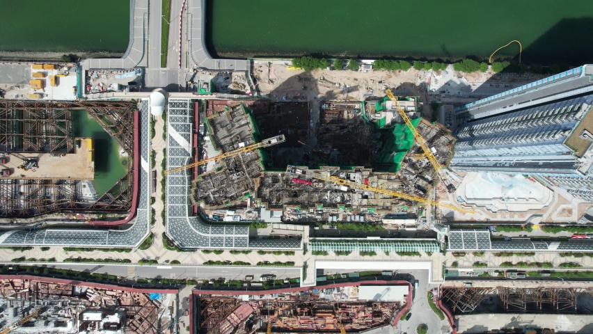 Commercial and residential construction development project in Kai Tak Cruise Terminal of Hong Kong city, Kwun Tong and Kowloon Bay near Victoria harbor, Aerial drone skyview | Shutterstock HD Video #1092575261