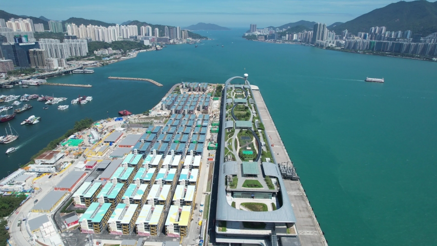 Commercial and residential construction development project in Kai Tak Cruise Terminal of Hong Kong city, Kwun Tong and Kowloon Bay near Victoria harbor, Aerial drone skyview | Shutterstock HD Video #1092575347
