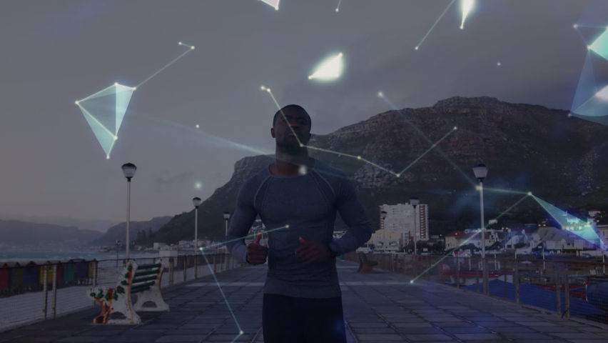 Animation of network of connections with globe over african american man running. Global connections, data processing and digital interface concept digitally generated video. | Shutterstock HD Video #1092579067