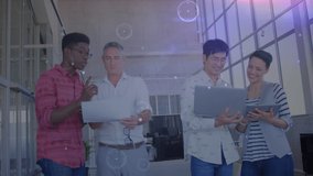 Animation of network of connections over diverse female and male coworkers in office. Business, connections, cooperation and technology concept digitally generated video. - Powered by Shutterstock - Get 15% off with code: PIKWIZARD15