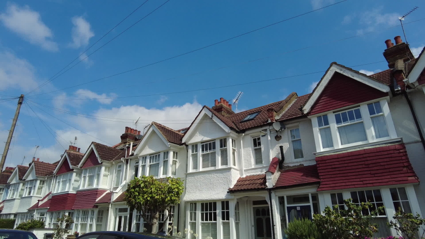 Residential street of period terraced houses in south west London Royalty-Free Stock Footage #1092620039