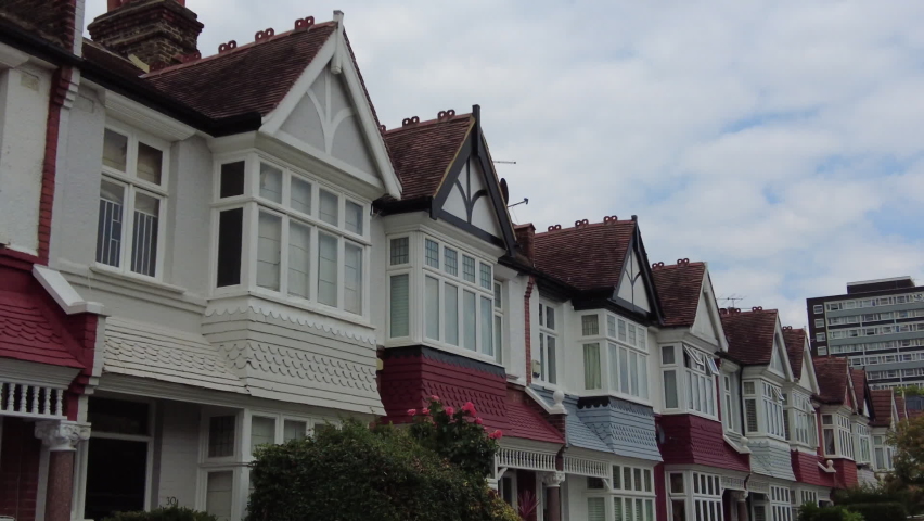 Residential street of period terraced houses in south west London Royalty-Free Stock Footage #1092620041