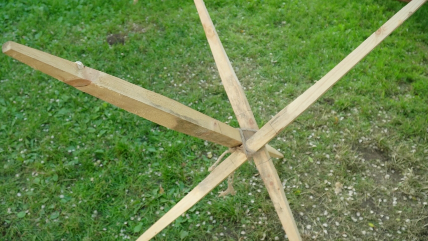 MOSCOW, RUSSIA - June 9, 2022: Wooden slingshot or hedgehog for defense against cavalry. Festival of Historical Reenactment Times and Epochs-2022 in June 2022 in Moscow Russian Federation