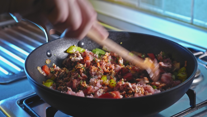 Preparing Chili con Carne Filling For Tortilla Recipe. close up