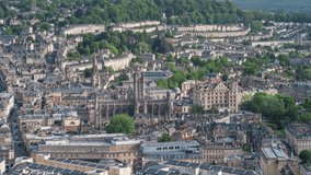 Establishing Aerial View Shot of Bath UK, Somerset, England United Kingdom day city center, cathedral