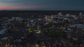 Establishing Aerial View Shot of Nottingham UK, Nottinghamshire, East Midlands, England United Kingdom night evening, center