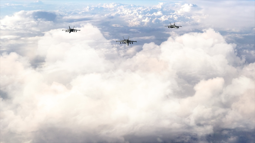 4k Aerial 3 Jet Fighters F-18 fly above clouds