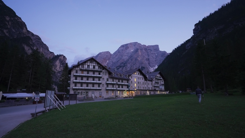 Hotel, The Pragser Wildsee (Lake Prags) (Lake Braies) mountain lakes at dusk, Seekofel, Dolomites, South Tyrol, Alto Adige, Italy, Europe