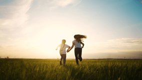 children and dog run in the park. happy family kid dream concept. two little girls sisters holding hands running summer on the grass in the park a shaggy dog runs nearby lifestyle. children run - Powered by Shutterstock - Get 15% off with code: PIKWIZARD15