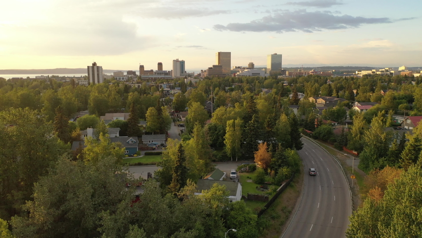 Aerial View of Anchorage, Alaska. Flying over Residential houses, downtown in the background
