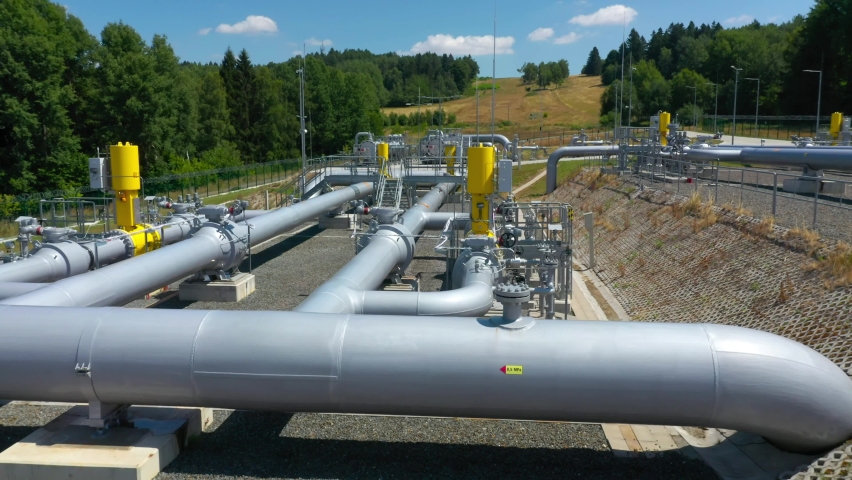 Gas pipeline Gazelle. One part of Nord Stream pipeline from Russia to European Union. High pressure pipes on a hot summer day. | Shutterstock HD Video #1092685023
