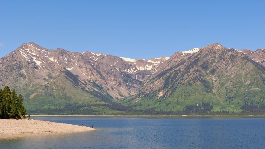 Sunny view of the Teton mountain range of Grand Teton National Park at Wyoming