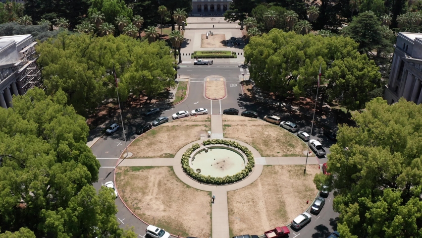 Close-up aerial tilting up shot of the California State Capitol building in Sacramento at daytime. 4K