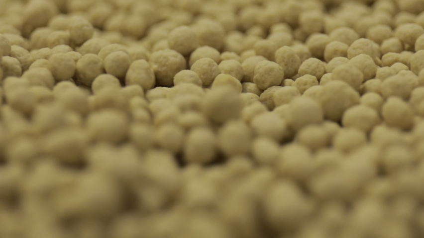 Nitrogen fertilizer granules at the factory Royalty-Free Stock Footage #1092700795