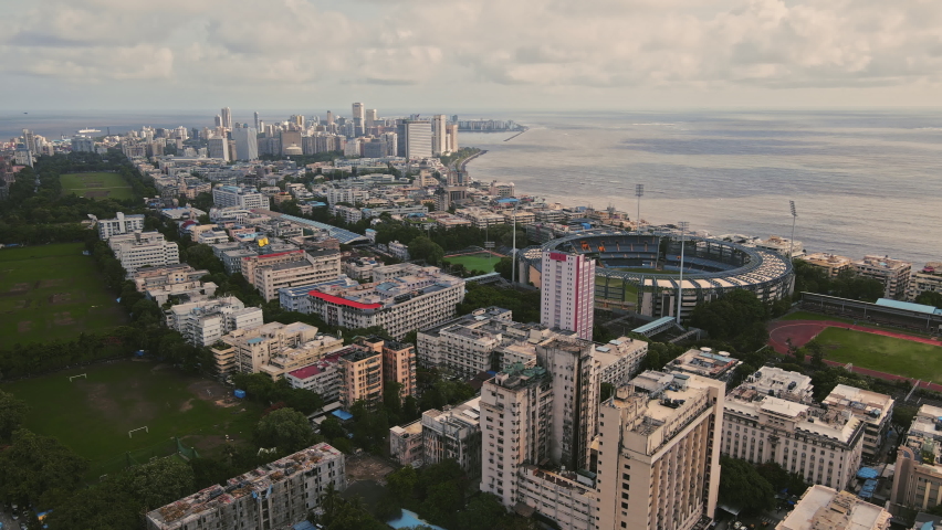 Aerial view of Mumbai City, Maharashtra, India. Drone shot of Mumbai skyline, beautiful cloudy weather during monsoon Royalty-Free Stock Footage #1092701907