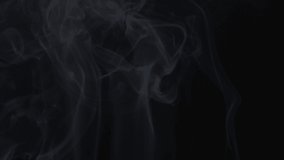 Slow motion of wooden fire smoke in black background, beautiful fog motion. Filmed on cinema camera, 8K downscale, 4K.