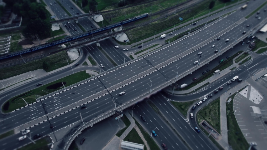 Drone over an urban freeway recognizes and identifies cars. Artificial intelligence-based software tracks vehicle and human movement for speed control, classification, and prediction. Royalty-Free Stock Footage #1092711413