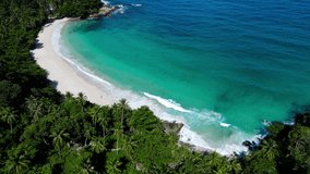 4K Professional video Aerial view high angle view Video slow motion landscape view of beach sea in summer sun good weather in island Phuket Thailand. Tropical sea Andaman sea Location Phuket Thailand.