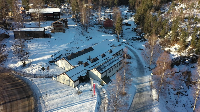 Main building of Hallingdal museum in Nesbyen Norway - Sunrise winter aerial above buildings exterior