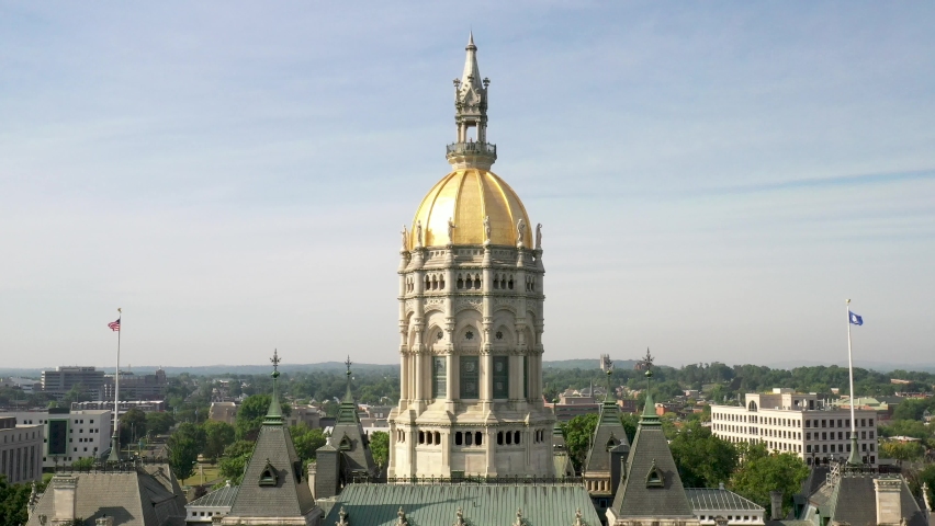 Connecticut state capitol in Hartford, Connecticut with close up of dome with drone video circling.