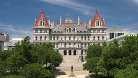 New York State capitol building in Albany, New York with drone video close up moving up.