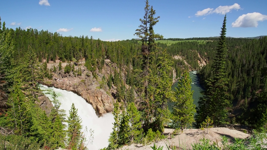 Sunny beautiful landscape of Upper Falls View in Yellowstone National Park at Wyoming