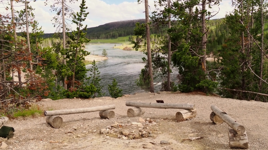 Sunny beautiful Yellowstone River landscape in Yellowstone National Park at Wyoming