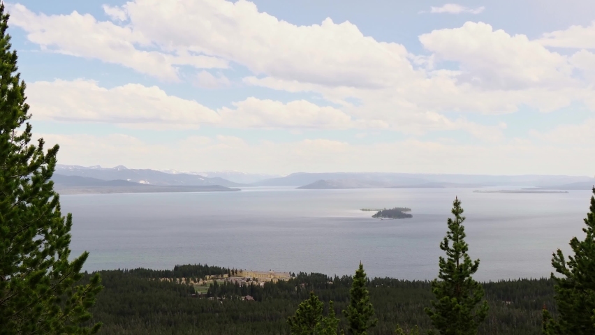 Sunny beautiful high angle view of the Yellowstone Lake landscape and Lake Yellowstone Hotel in Yellowstone National Park at Wyoming