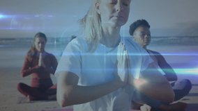 Animation of network of connections with icons over diverse women meditating. Global sport and digital interface concept digitally generated video.