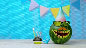 Creative birthday greeting copy space for thirteen year old. Video postcard happy birthday muffin with candles with number 13. Watermelon character in a comic smile holiday decorations congratulation
