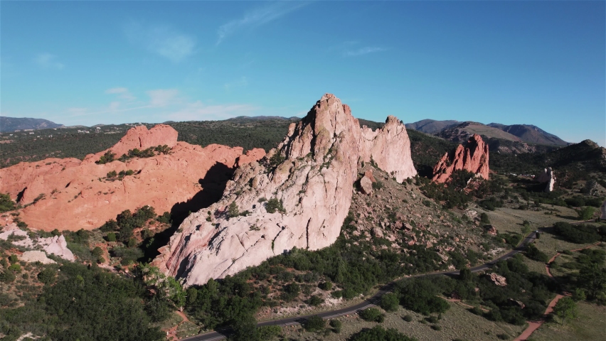 Garden of the Gods Colorado Drone View 13 4K features a view from a drone flying right to left around a large rock formation at the Garden of the Gods, Colorado.