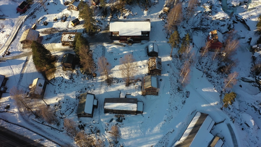 Hallingdal folk museum Nesbyen beautiful top-down sunrise aerial with golden light and long shadows