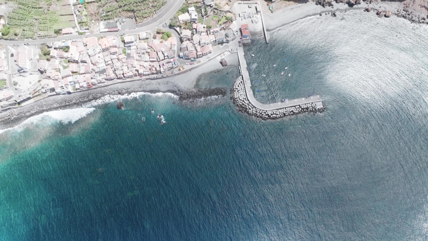 Marina, Waterfalls And Caminho Real do Paul do Mar On A Sunny Day In Madeira, Portugal. - aerial tilt up